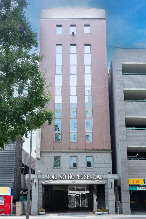 a pink building with the words not no hotelstand at Mori-no-Hotel Sendai in Sendai