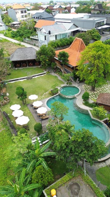 an aerial view of a resort with a swimming pool at Natajiwa Village, close to Canggu and Seminyak in Seminyak