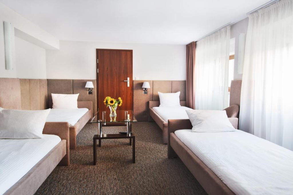 Voodi või voodid majutusasutuse Hotelik B&B Pod Dębami toas