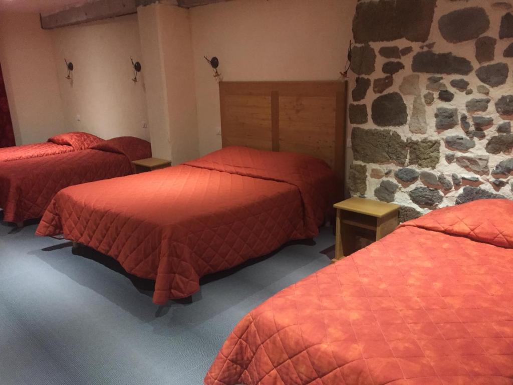 Postel nebo postele na pokoji v ubytování Le Bilboquet