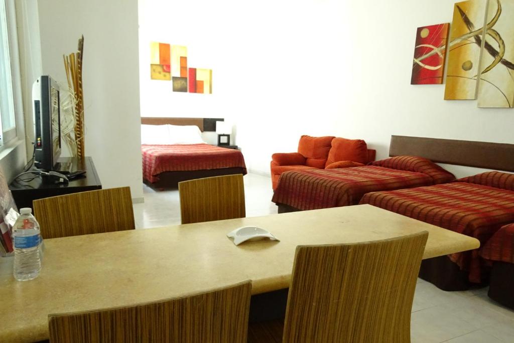 Posezení v ubytování Aparthotel Siete 32