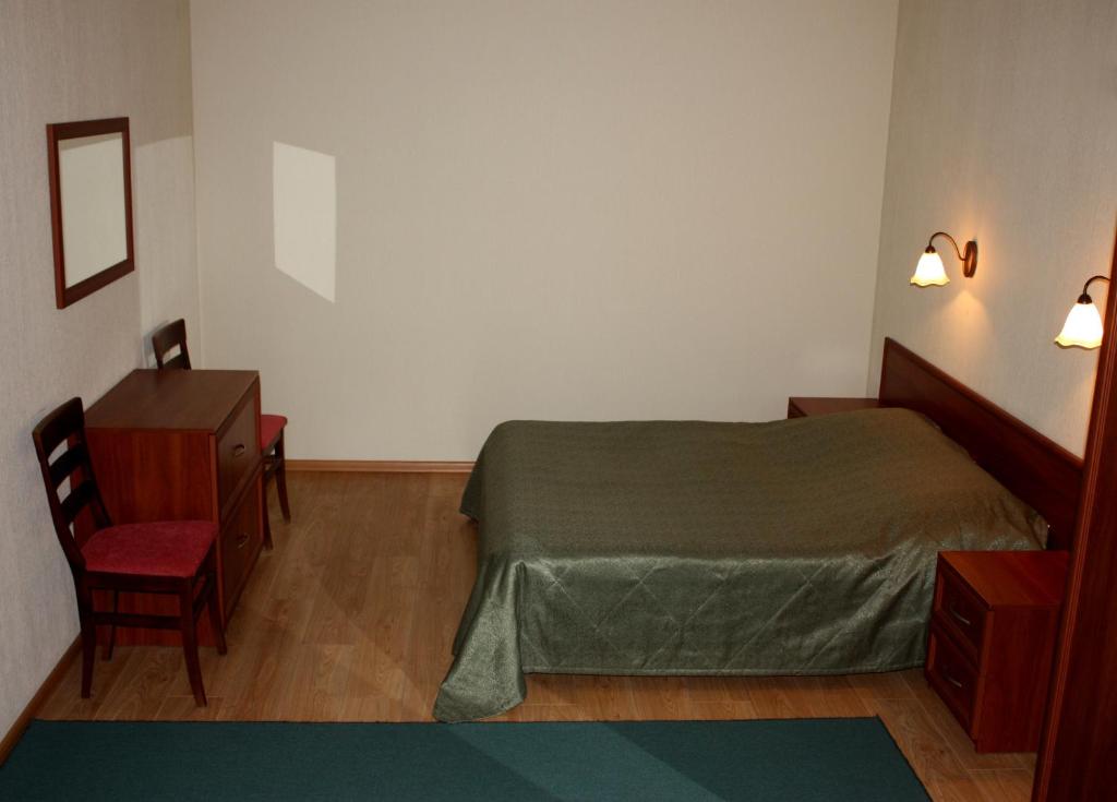 Postel nebo postele na pokoji v ubytování Mini-hotel on Geroiv Energetykiv Street 18