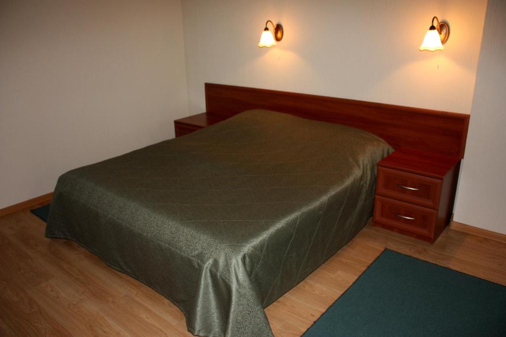 Postel nebo postele na pokoji v ubytování Mini-hotel on Geroiv Energetykiv Street 18
