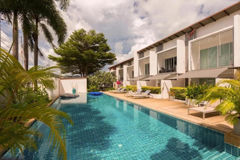 an image of a swimming pool at a resort at Townhouse Six9 The Pool Residence in Koh Samui