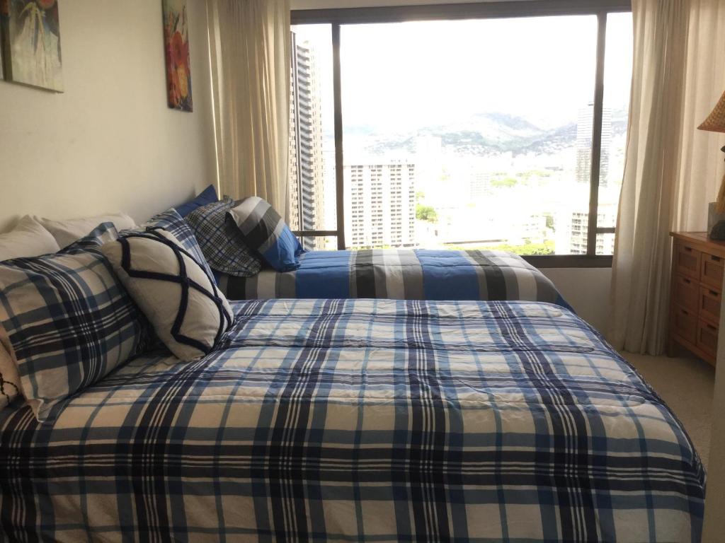 Ліжко або ліжка в номері Waikiki Ala Moana 1 bedroom Condo