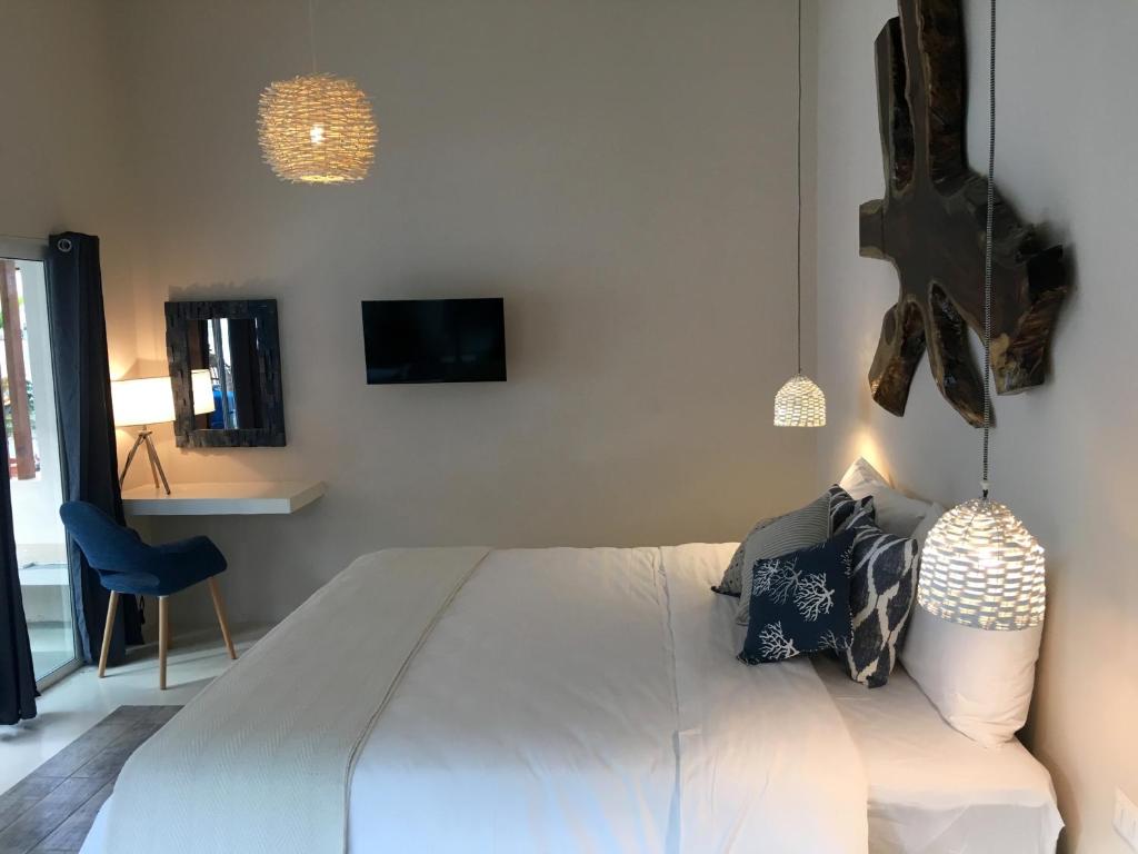Postel nebo postele na pokoji v ubytování La Ramona Charming Hotel