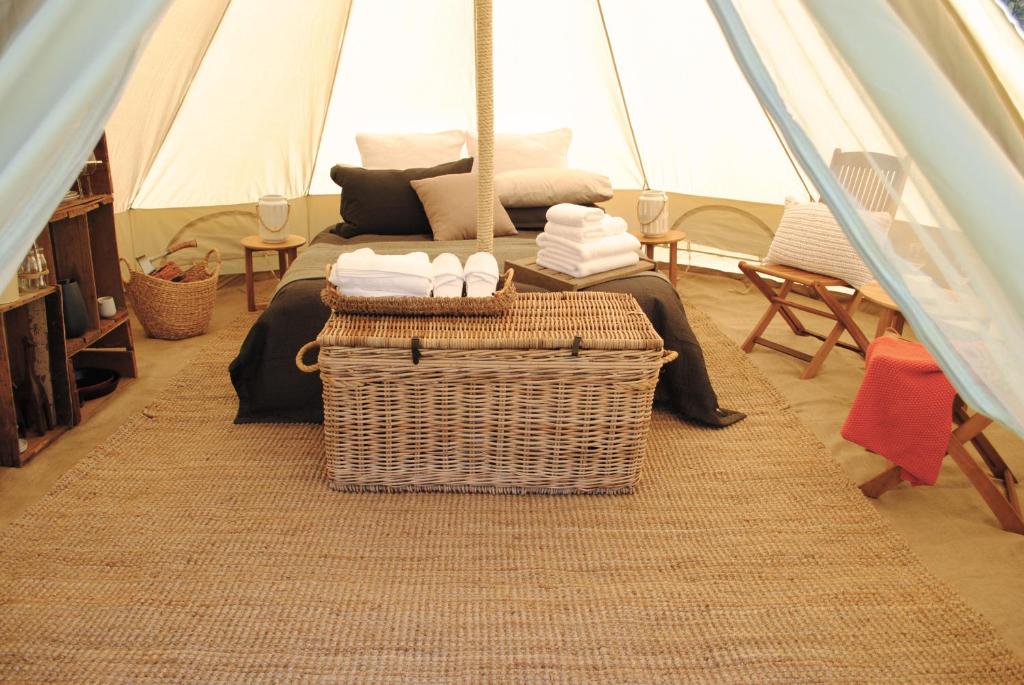 a room with a bed in a tent at Cosy Tents - Daylesford in Yandoit