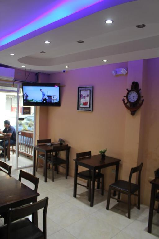 TV a/nebo společenská místnost v ubytování Hostal Rosa Mar