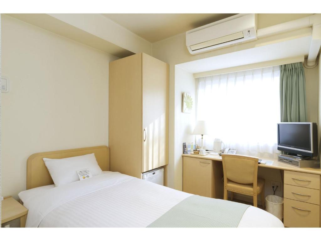 TV a/nebo společenská místnost v ubytování Hotel Famy Inn Kinshicho