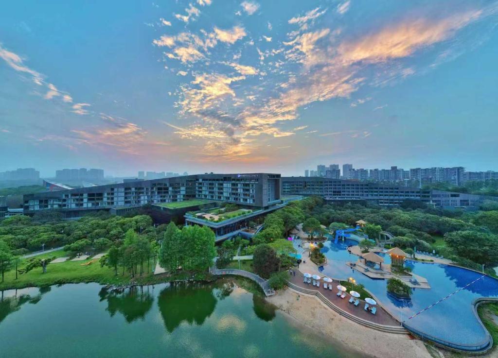 an aerial view of a resort with a lake at Hyatt Regency Dongguan in Dongguan