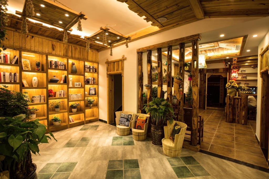 a room with a store with plants in it at Chong Chong Guesthouse in Zhangjiajie