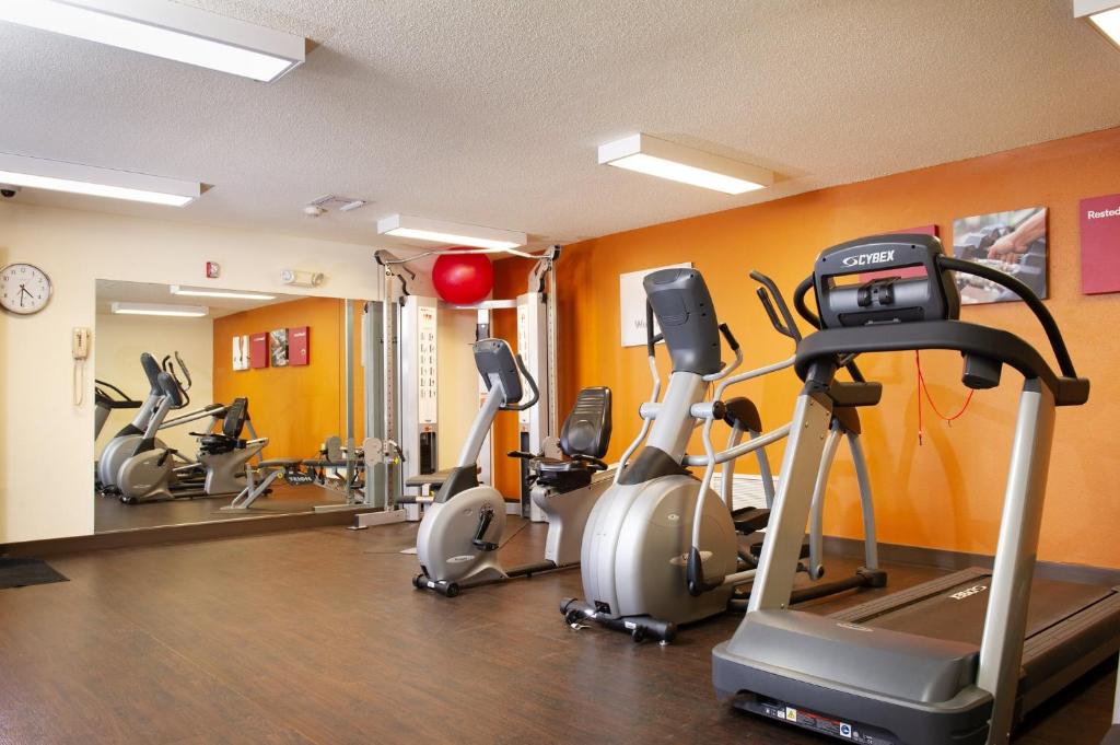 a gym with several exercise bikes in a room at Holiday Inn Express & Suites Hayward by IHG in Hayward