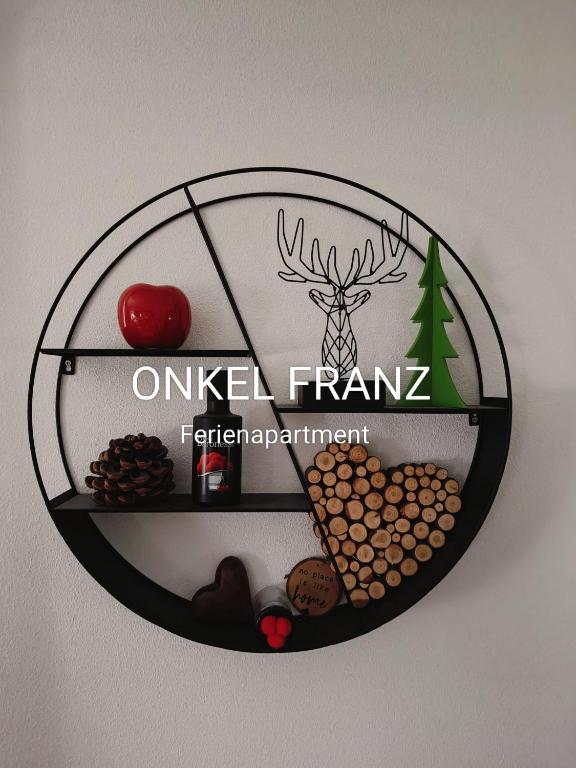 a circular shelf with cookies and a reindeer on it at Onkel Franz in Ohlsbach