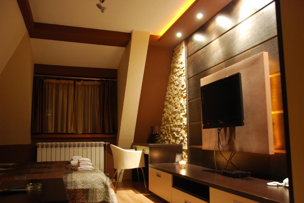 Μια τηλεόραση ή/και κέντρο ψυχαγωγίας στο Ski & Relax Apartment