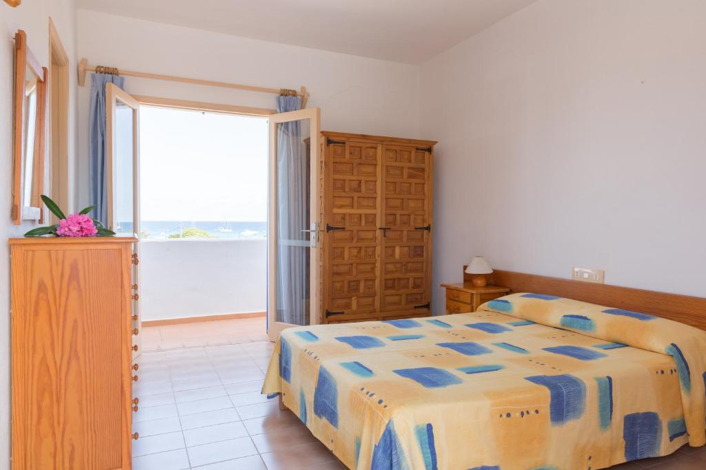 Postel nebo postele na pokoji v ubytování Hostal Mayans