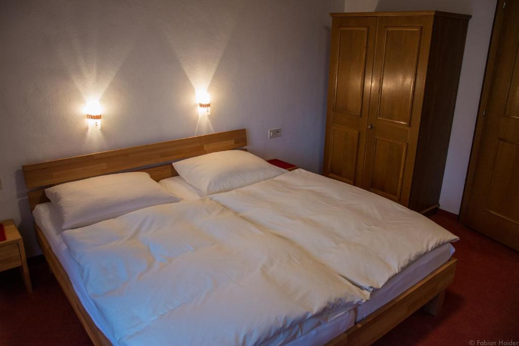 Postel nebo postele na pokoji v ubytování Haus Kristall