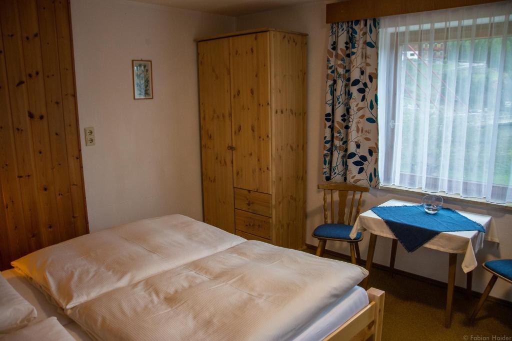 Postel nebo postele na pokoji v ubytování Haus Kristall