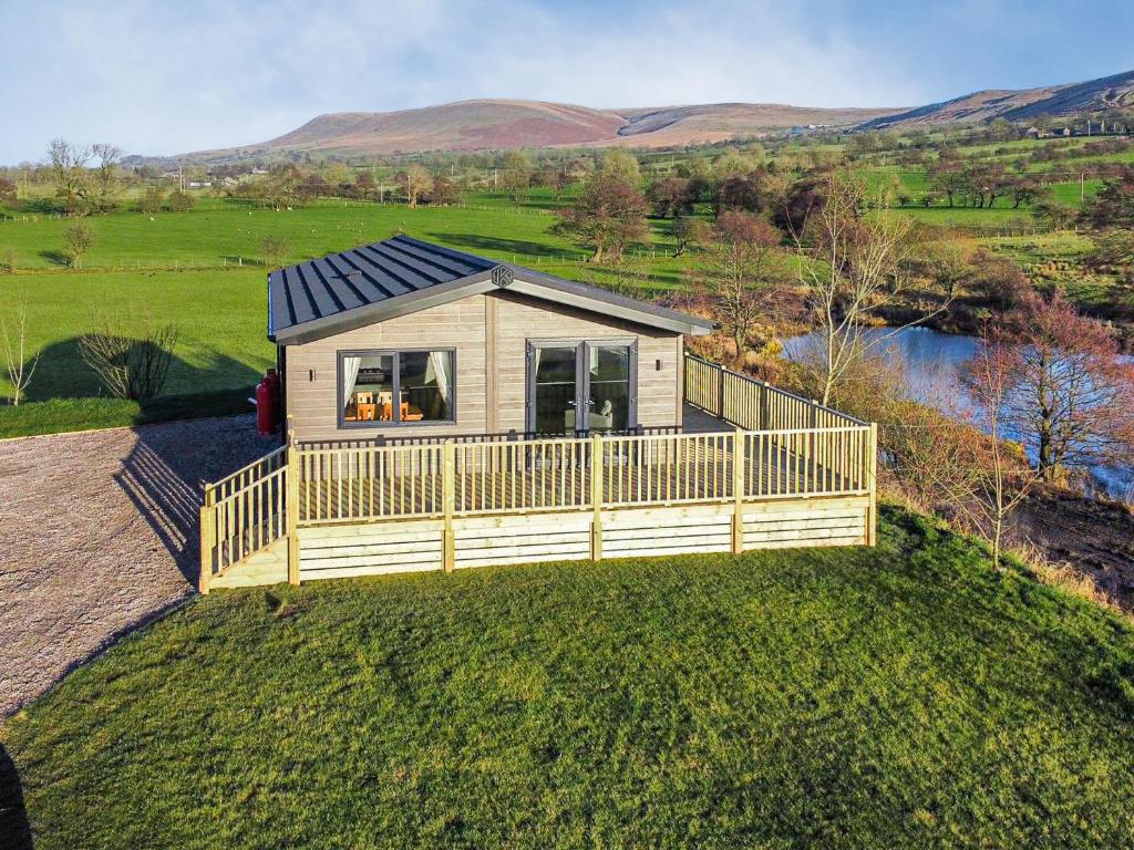 an aerial view of a tiny house on a hill at The View - Uk36812 in Whalley