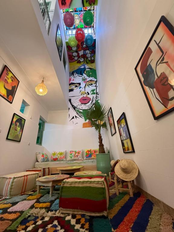 a living room with a couch and a table at Riad R Art in Marrakesh