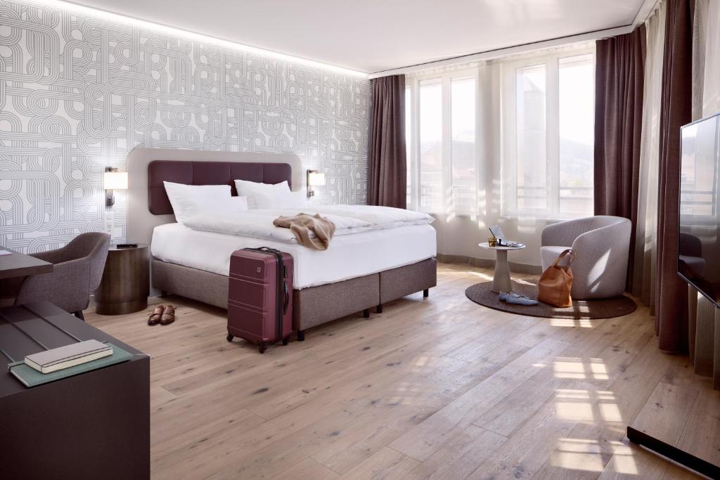 Hotel Walhalla tesisinde bir odada yatak veya yataklar