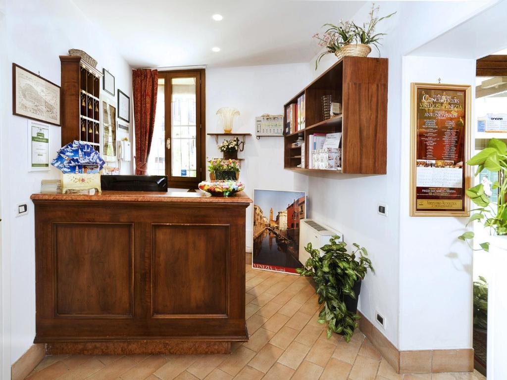 Kuchyň nebo kuchyňský kout v ubytování Locanda Casa Querini