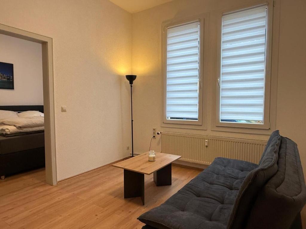 a living room with a couch and a coffee table at Gemütliche Unterkunft Sankt Blasien in St. Blasien