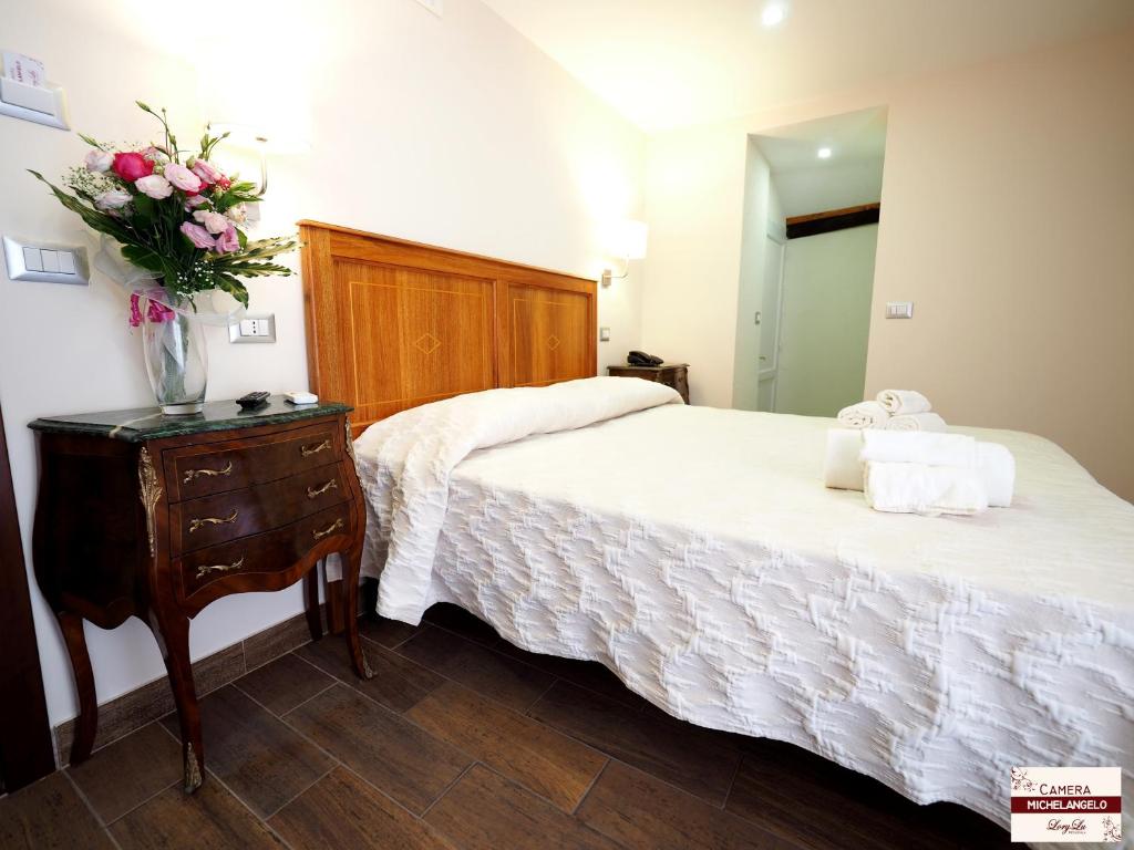 Letto o letti in una camera di LoryLu