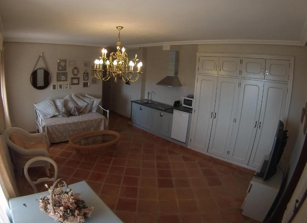 Kuchyň nebo kuchyňský kout v ubytování Apartamentos Baeza RN