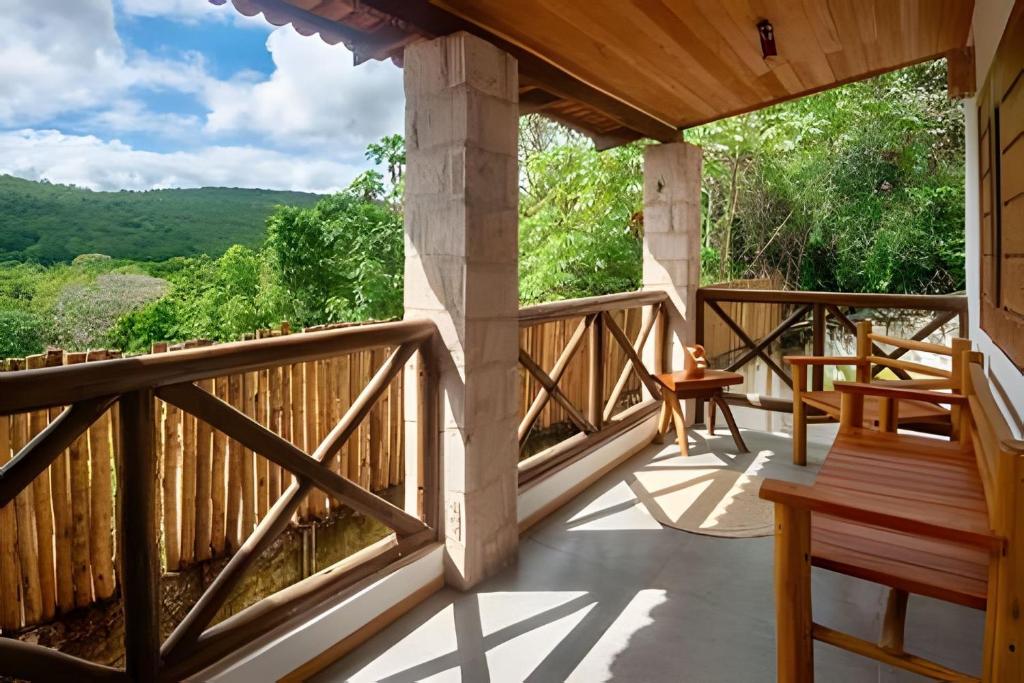 a porch with a view of the mountains at Casa Brisa do Vale - Ar condicionado nos 2/4 .. in Lençóis
