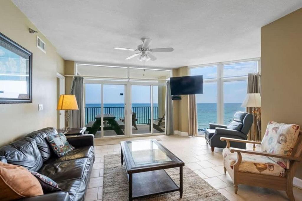 a living room with a view of the ocean at Jade East Towers 0740 in Destin