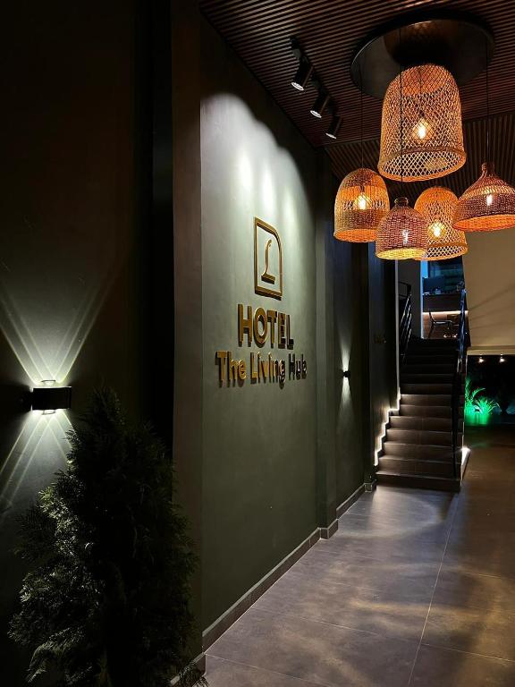 a hallway with lights and stairs in a building at The Living Hub in La Dorada