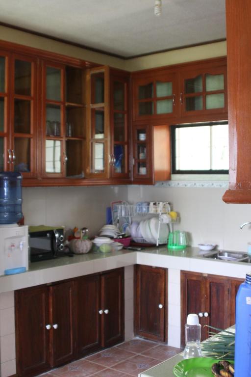 Kuchyň nebo kuchyňský kout v ubytování Mayoyao View Inn