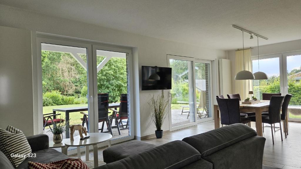 a living room with a couch and a table at Sternenhimmel in Lenz