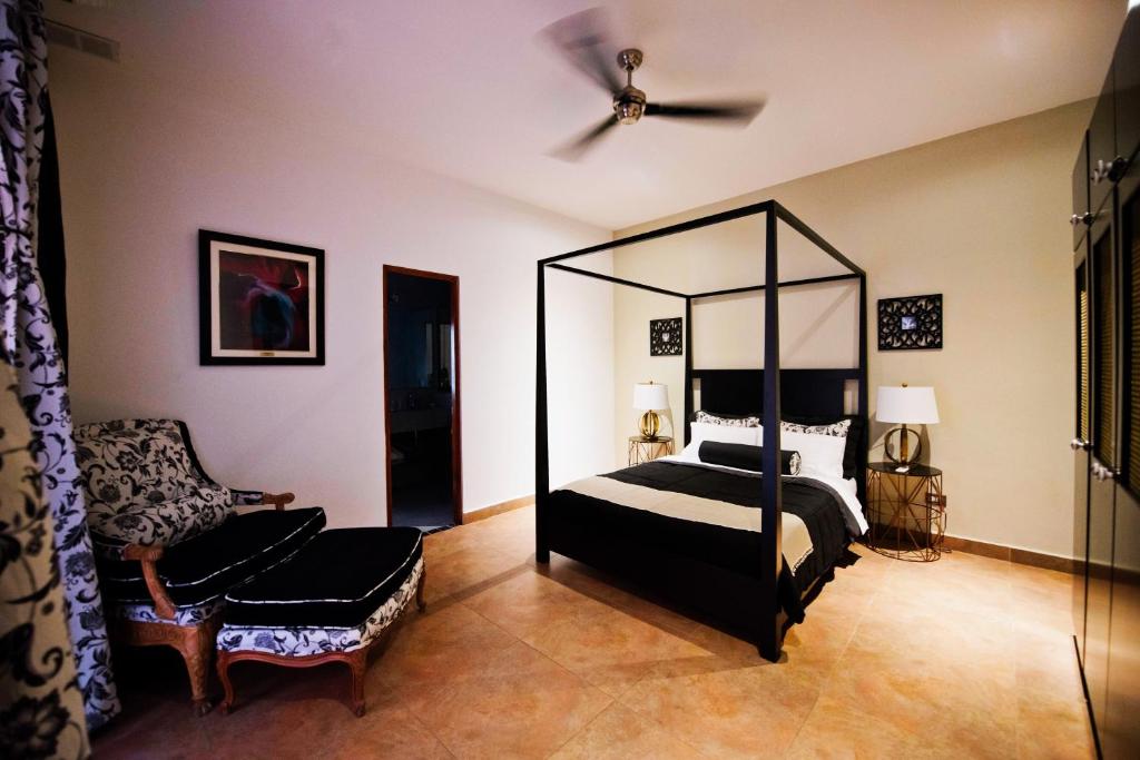 Voodi või voodid majutusasutuse La Isabela Suites toas