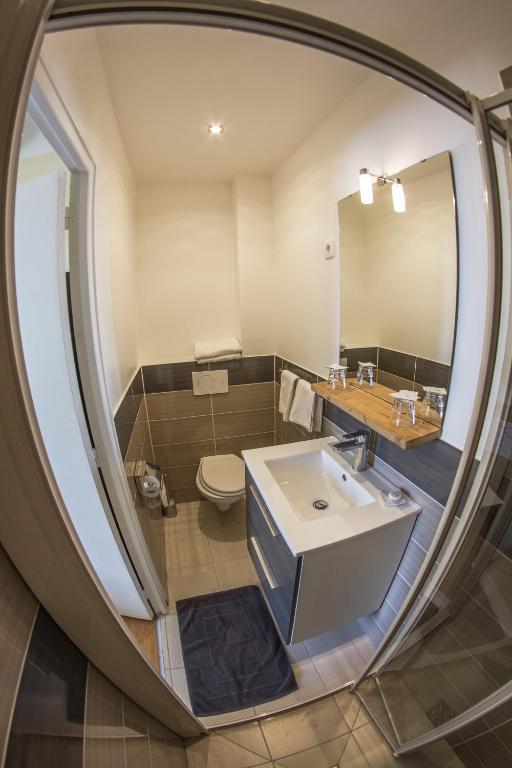 Koupelna v ubytování Hôtel Trianon