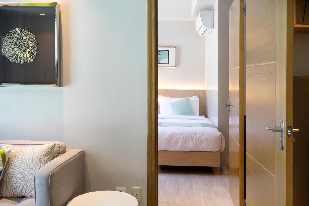 Postel nebo postele na pokoji v ubytování Watergate Boutique Hotel