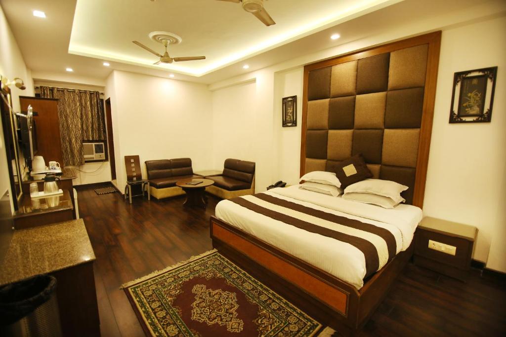 Postel nebo postele na pokoji v ubytování Hotel Parkway Deluxe