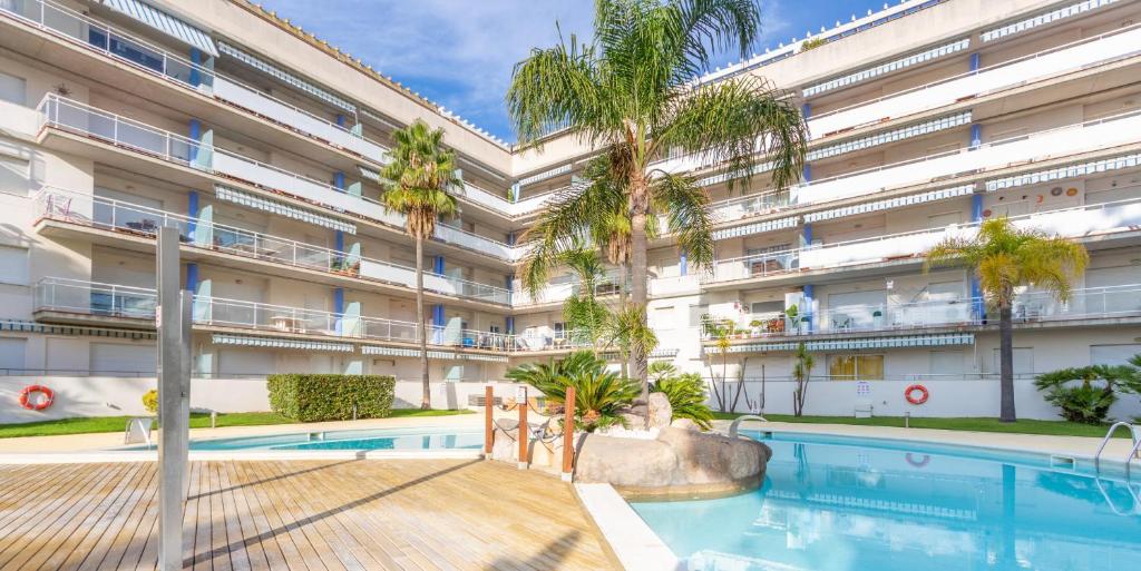 Apart-rent Apartamento Port Canigo 2005 con piscina comunitaria y vista al canal