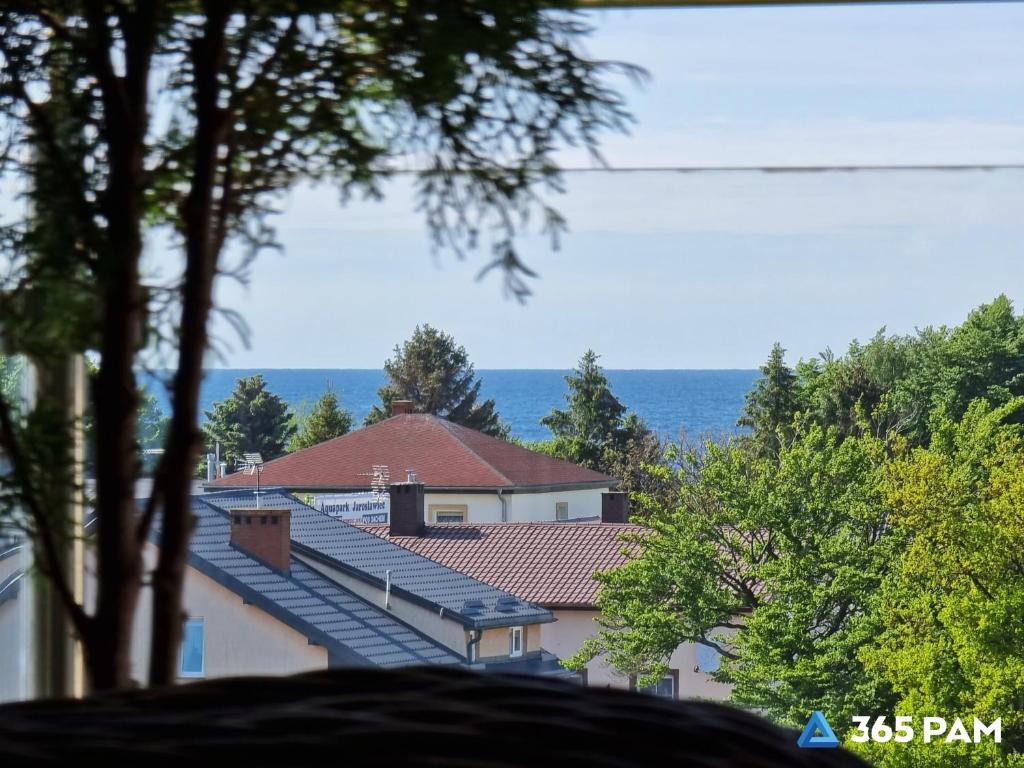 a view of a building with a row of stairs at 365PAM - Apartament 5 Mórz - BASEN, PLAC ZABAW, PARKING W CENIE in Sianozety