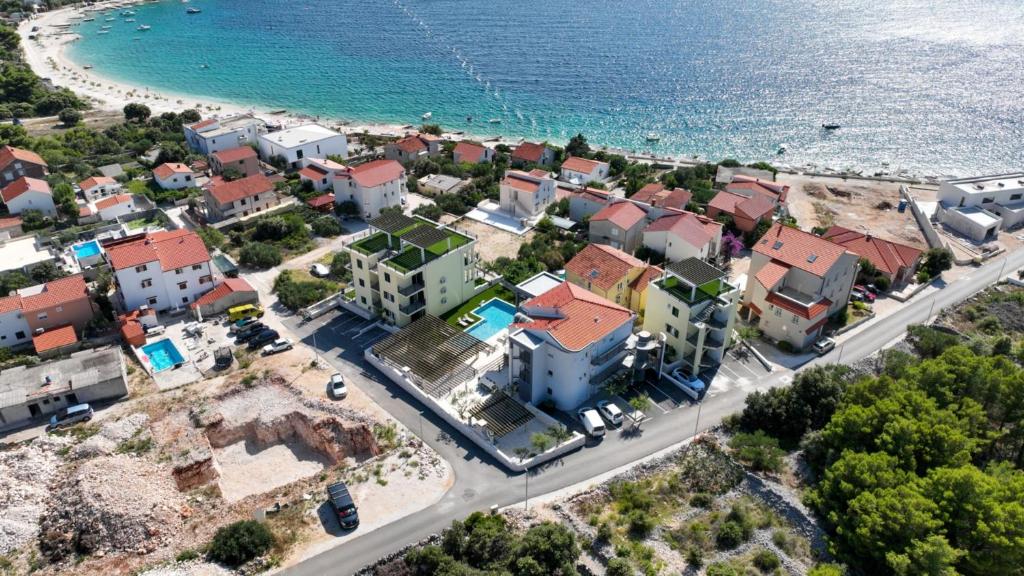 an aerial view of a town next to the ocean at Luxury Apartment Nala with shared pool in Sevid