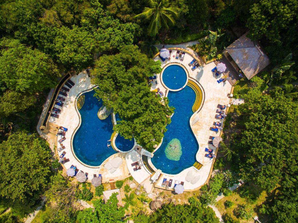 an aerial view of a resort with two swimming pools at Sensi Paradise Beach Resort in Koh Tao