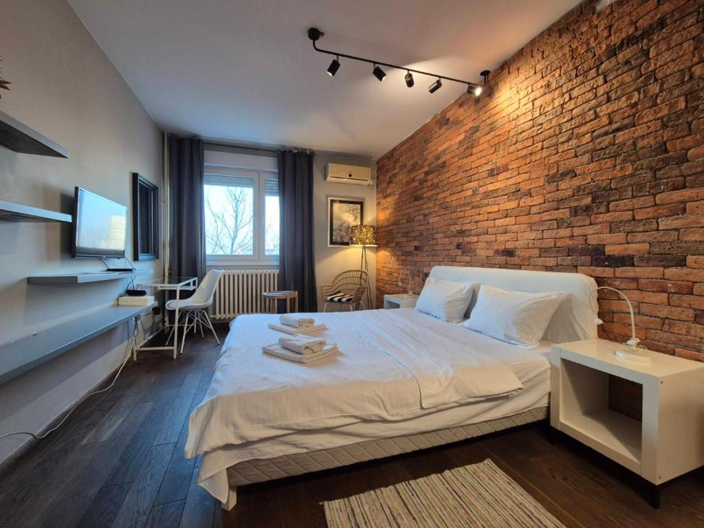 Llit o llits en una habitació de Apartment Madera