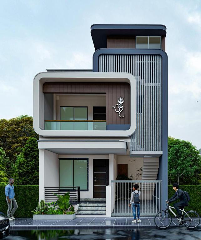 a house with two people on a bike in front of it at Shiv Guest house in Ellora