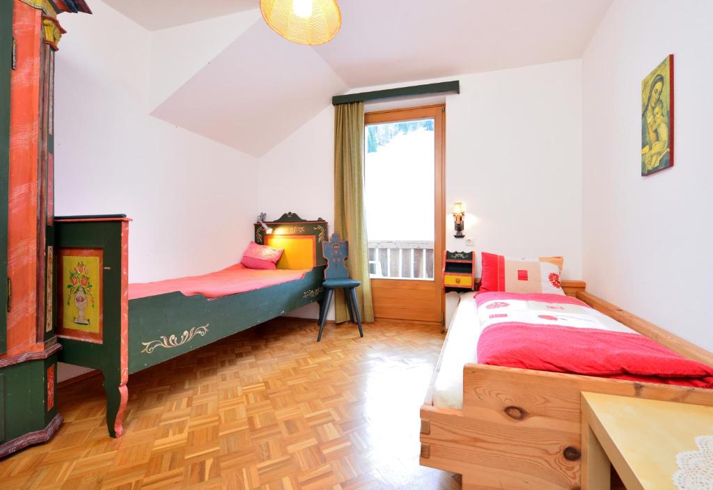 Postel nebo postele na pokoji v ubytování Haus Mitterrutzner
