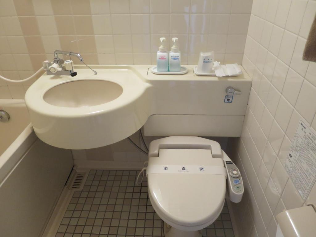 Koupelna v ubytování Hotel Heisei