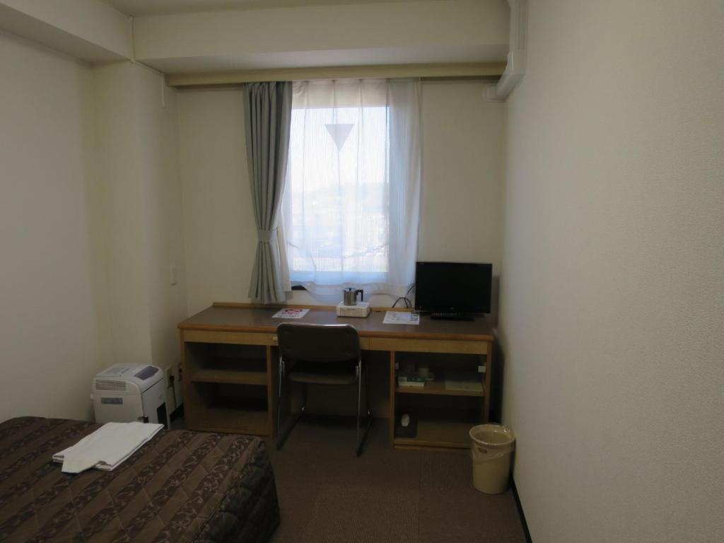 TV a/nebo společenská místnost v ubytování Hotel Heisei