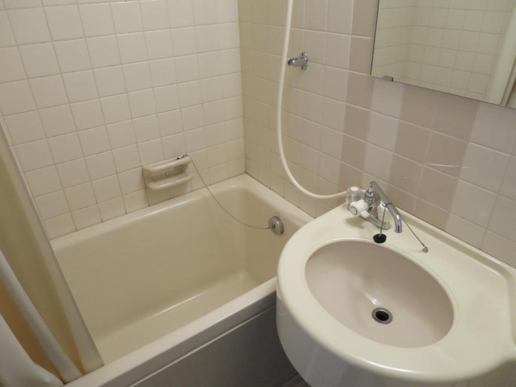 Koupelna v ubytování Hotel Heisei