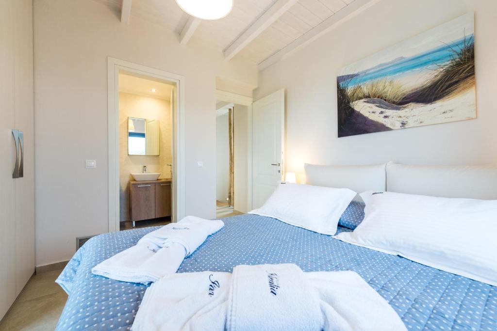 Postel nebo postele na pokoji v ubytování Villa Idealia