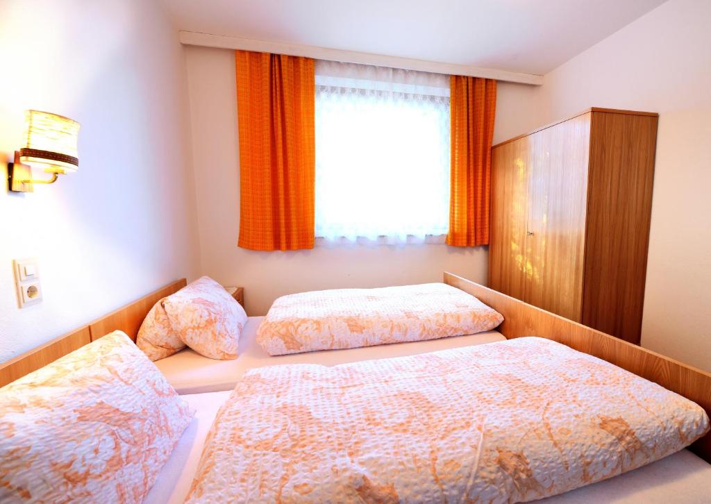 Postel nebo postele na pokoji v ubytování Haus Mitterrutzner