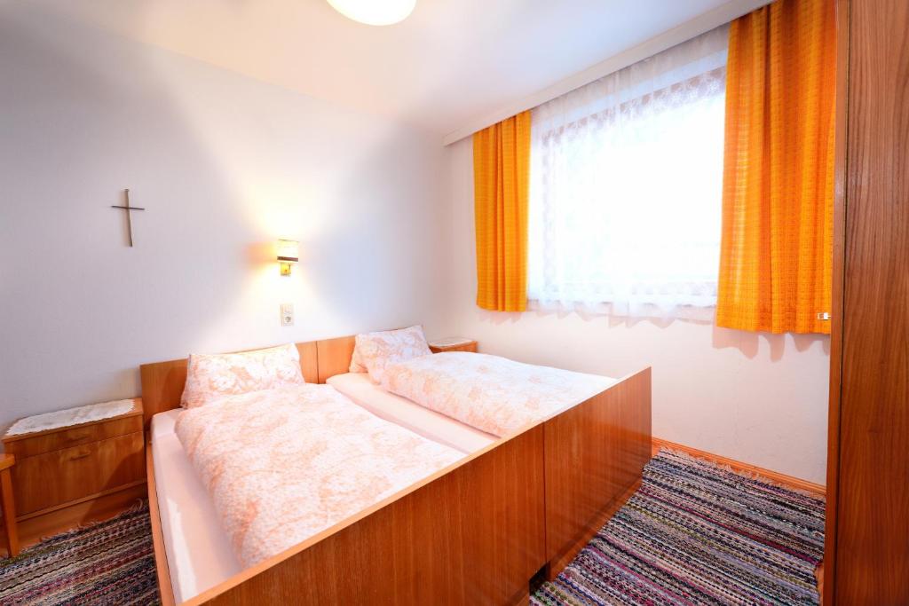 Postel nebo postele na pokoji v ubytování Haus Mitterrutzner